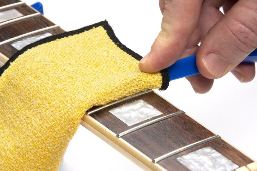 MN125-Action-2.jpg Music Nomad MN125 F-ONE Unfinished Fretboard Care Kit