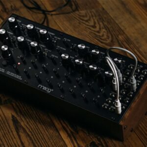 Moog DFAM - patched on a desk Moog DFAM Analog Percussion Synthesizer