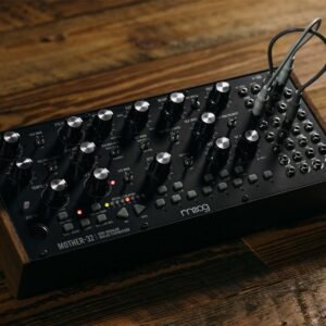Moog Mother-32 - patched on a desk Moog Mother 32 Semi Modular Synthesizer